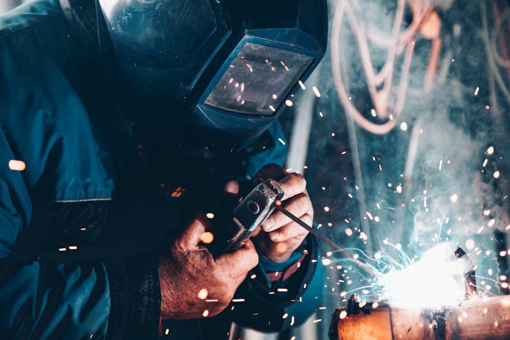 Skilled worker finishing a cast component